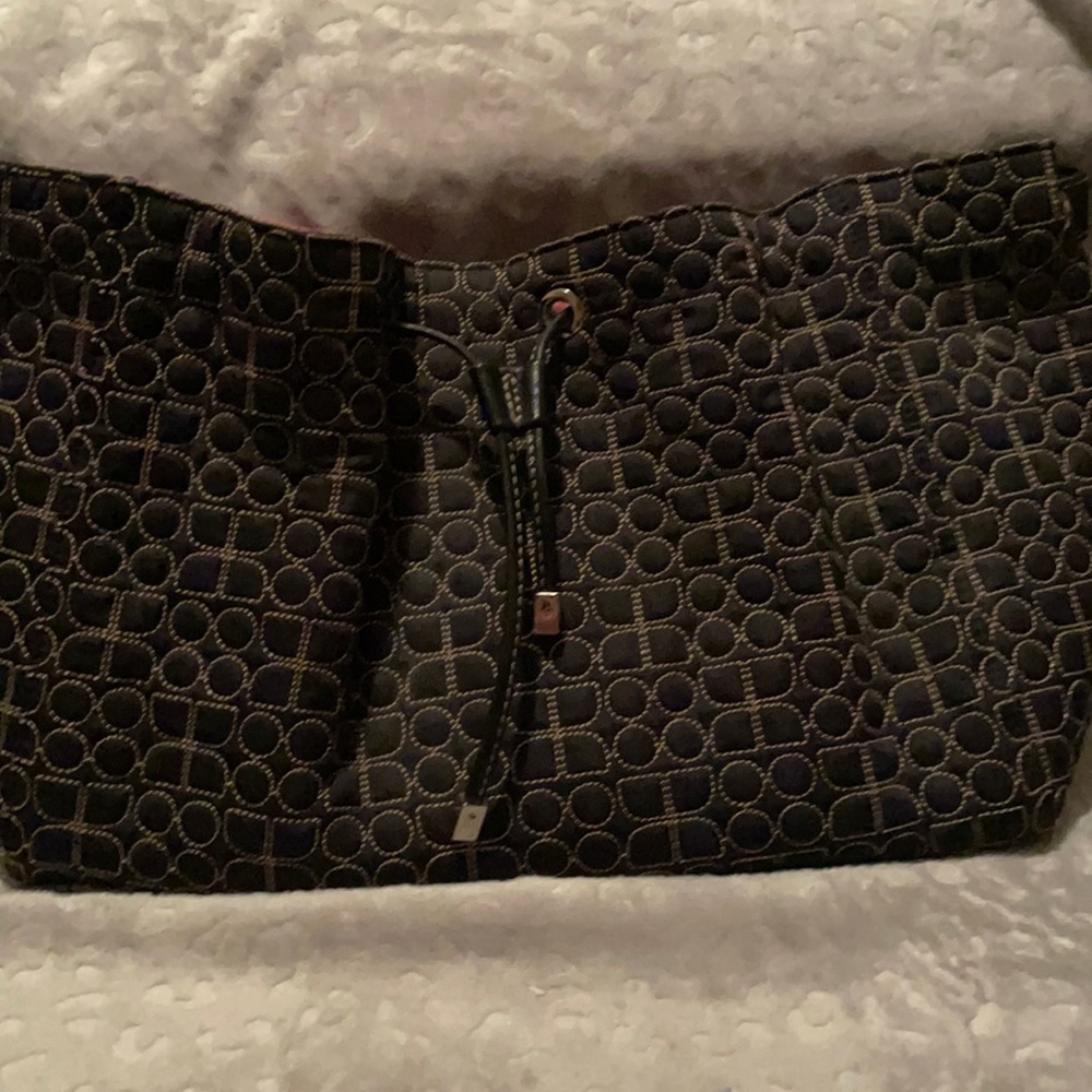 Kate Spade Purse. Black design with light gold stitching. Very good condition.